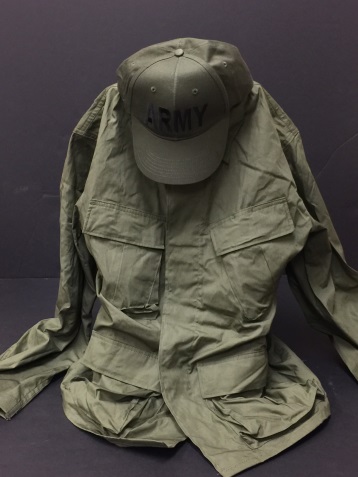An olive drab cap and long-sleeved jacket.